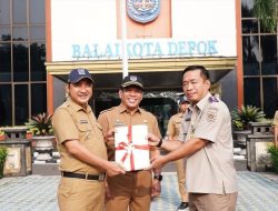 BPN Kota Depok Serahkan 50 SHM Elektronik Milik Pemkot Depok